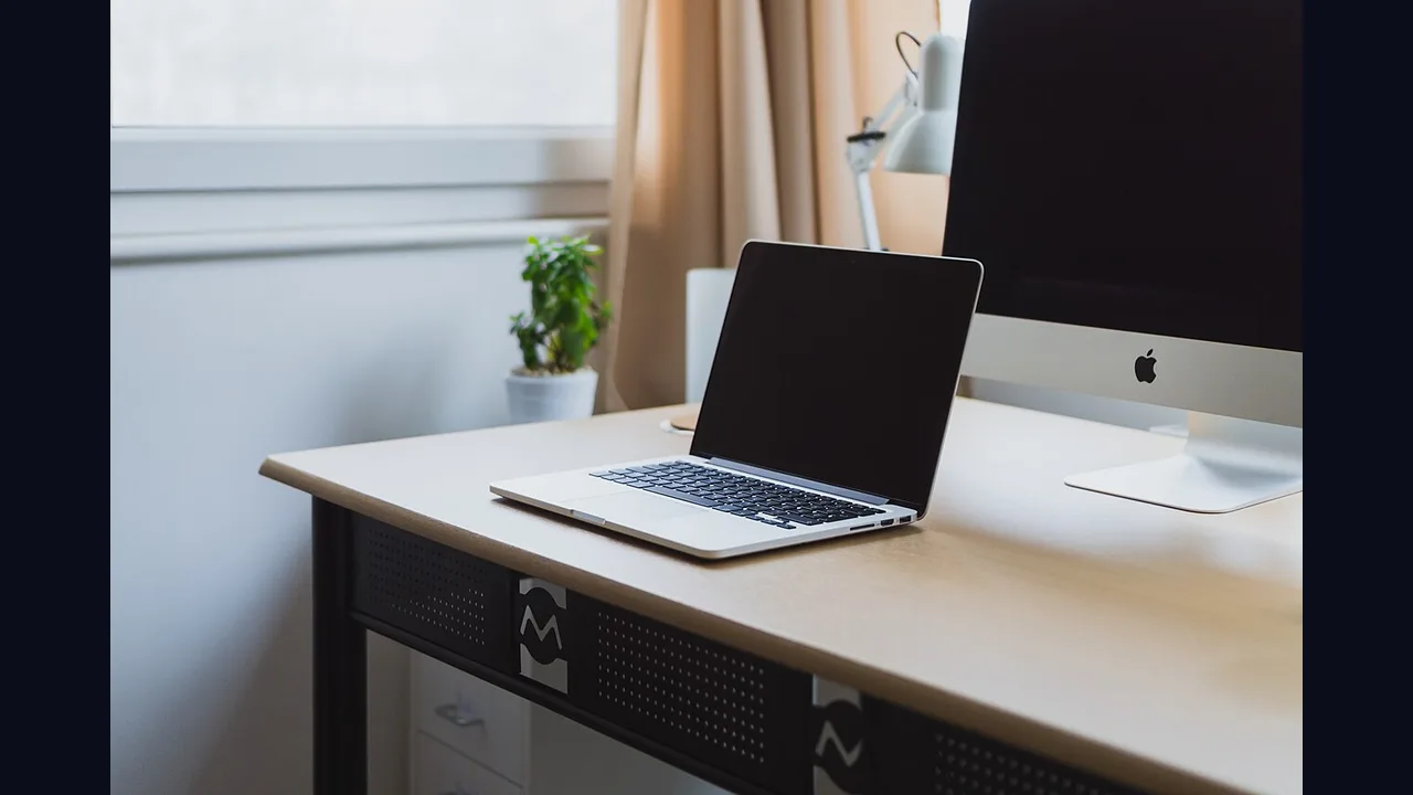 An older laptop on a desk